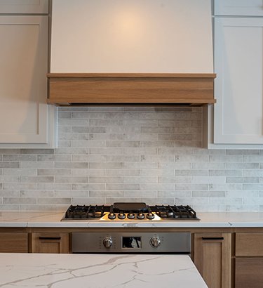Authentic custom tile backsplash completed by Fusion Finishing