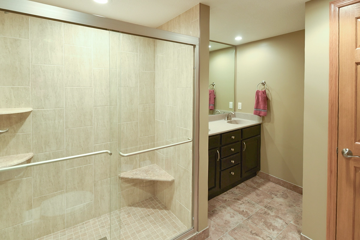 Finished lower-level tiled bathroom addition in Ramsey MN